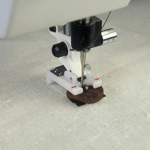 sewing buttons with the Husqvarna Viking Button Foot with Placement Tool