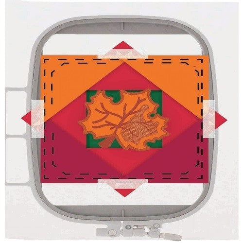 Hold fabric in the embroidery hoop