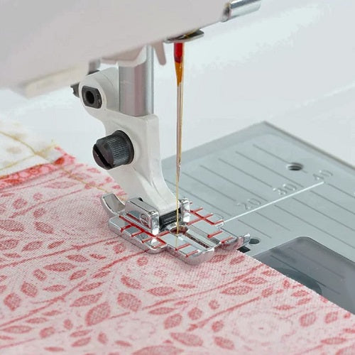 sewing a 1/4" seam with the husqvarna viking adjustable 1/4" foot