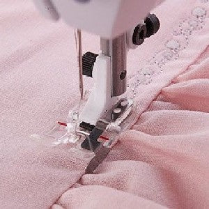 another view of sewing along an edge with the Husqvarna Viking Clear B Edge Stitching Foot