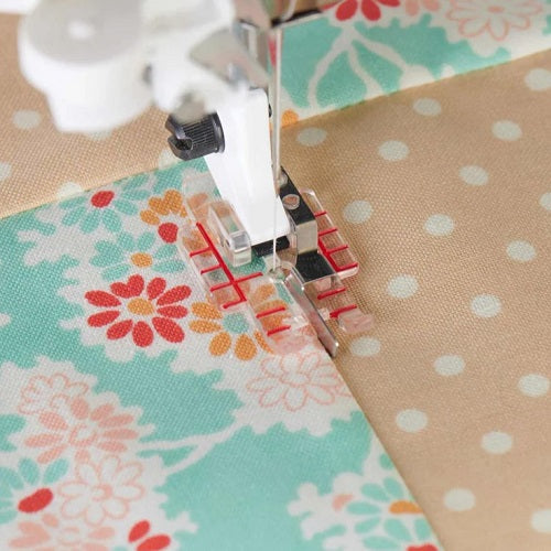 stitching in the ditch with The Husqvarna Viking Clear Stitch In Ditch Foot