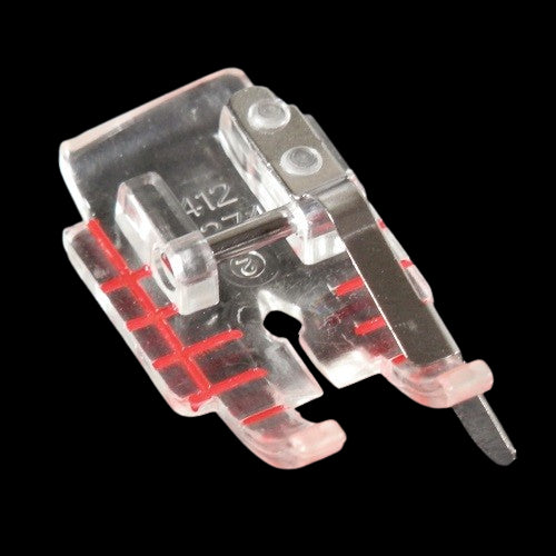 close up of the Husqvarna Viking Clear 1/4" Piecing Foot with Guide