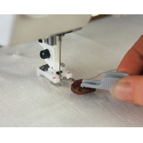 using the placement tool with the Husqvarna Viking Button Foot with Placement Tool
