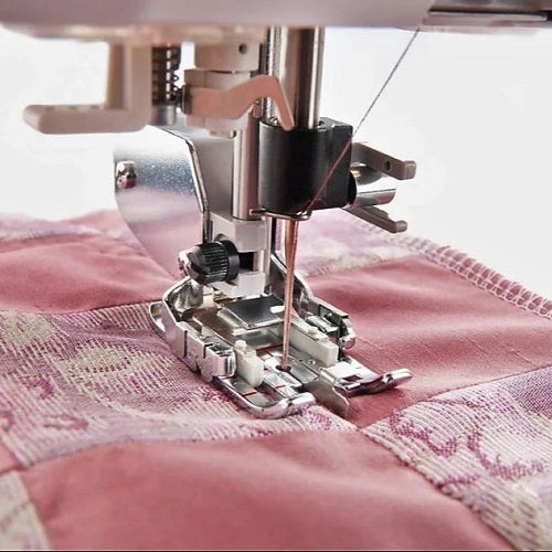 using the the Husqvarna Viking Changeable Quilter's Guide Foot.
